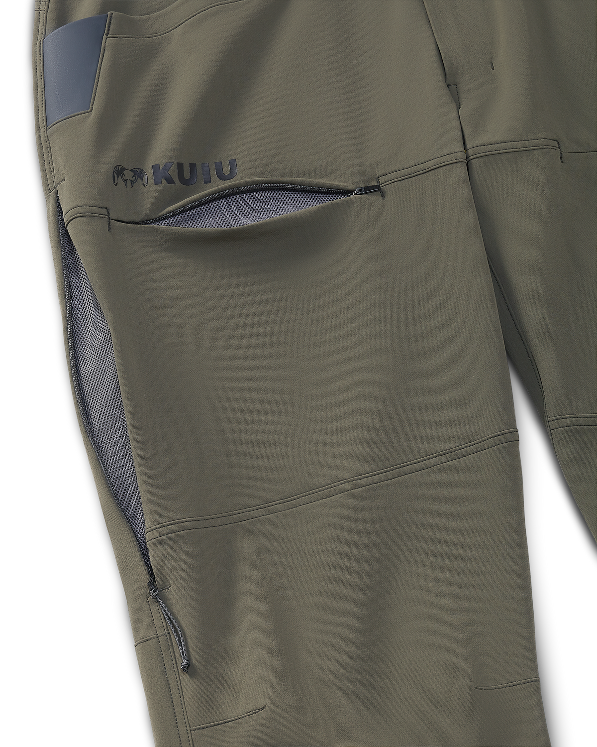 Close-up of front hidden zipper thigh pocket and side zippered mesh hip vent on Reed Pant in Ash Brown